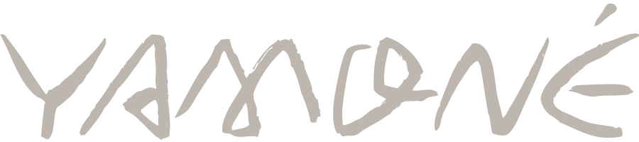 Logotipo da marca YAMDNÉ.