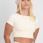 TOP AMÉLIA MACADÂMIA: Top cropped cor macadâmia, parte de conjunto esportivo feminino.